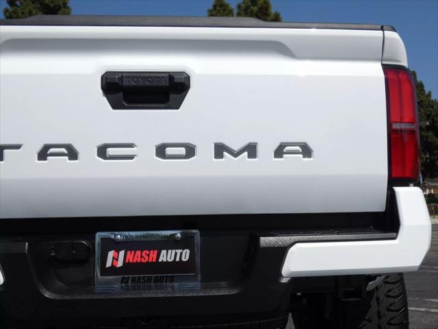used 2025 Toyota Tacoma car, priced at $50,990