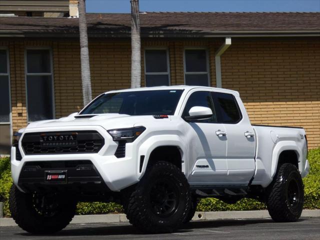 used 2025 Toyota Tacoma car, priced at $50,990