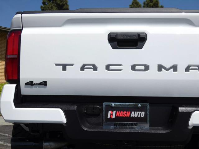 used 2025 Toyota Tacoma car, priced at $50,990
