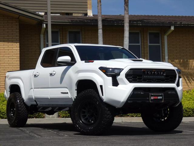 used 2025 Toyota Tacoma car, priced at $50,990