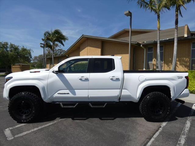 used 2025 Toyota Tacoma car, priced at $50,990