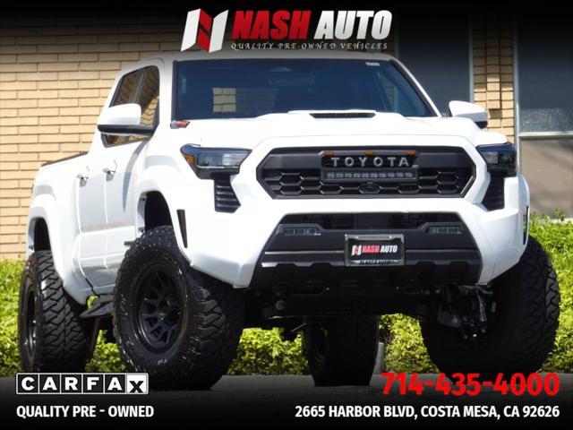 used 2025 Toyota Tacoma car, priced at $50,990