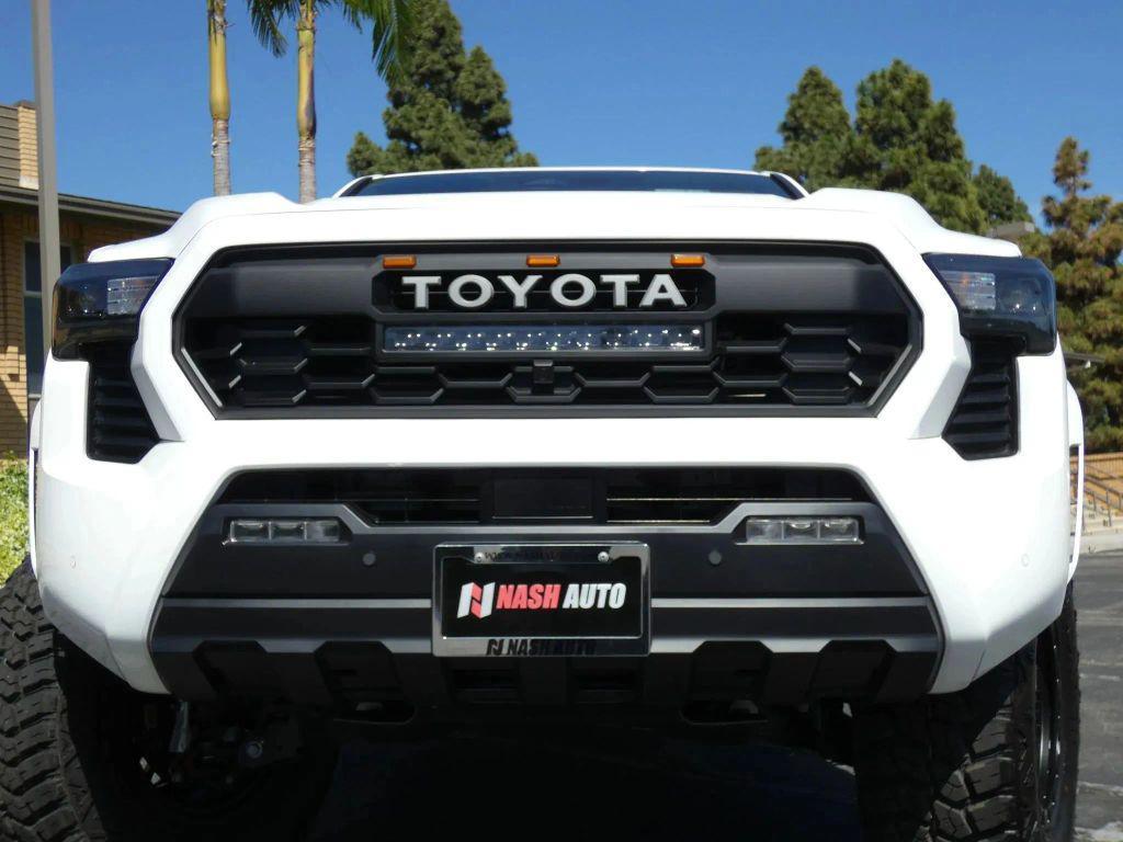 used 2025 Toyota Tacoma car, priced at $44,990