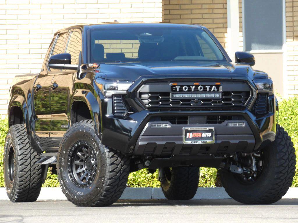 used 2024 Toyota Tacoma car, priced at $39,990