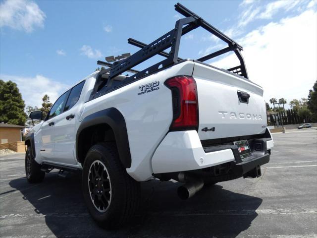 used 2025 Toyota Tacoma car, priced at $54,399