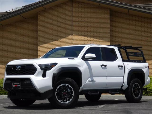 used 2025 Toyota Tacoma car, priced at $54,399