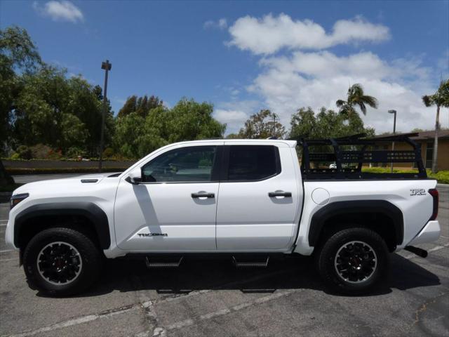 used 2025 Toyota Tacoma car, priced at $54,399