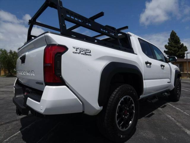 used 2025 Toyota Tacoma car, priced at $54,399
