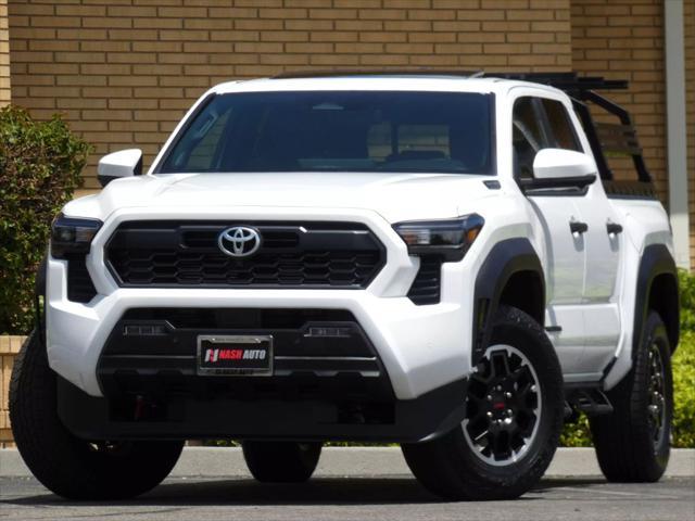 used 2025 Toyota Tacoma car, priced at $54,399