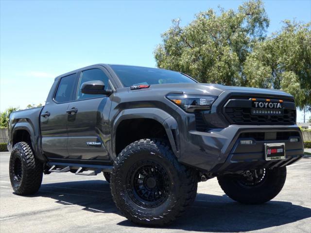 used 2025 Toyota Tacoma car, priced at $44,990