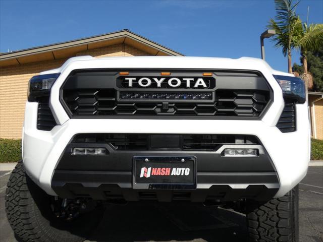 used 2024 Toyota Tacoma car, priced at $46,990