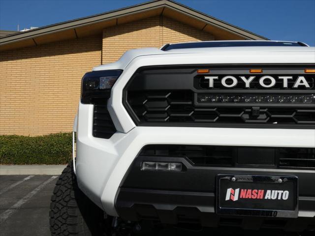 used 2024 Toyota Tacoma car, priced at $46,990