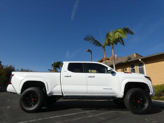 used 2024 Toyota Tacoma car, priced at $46,990