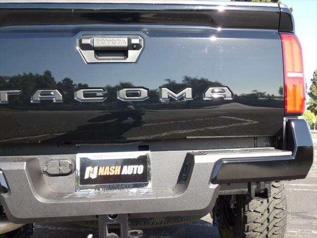 used 2025 Toyota Tacoma car, priced at $47,990
