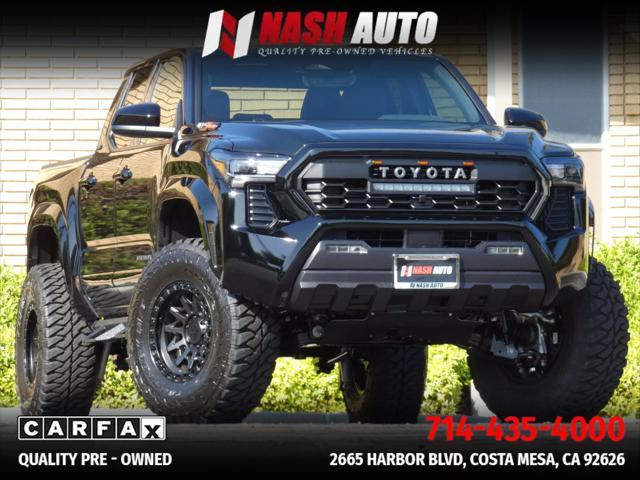 used 2025 Toyota Tacoma car, priced at $47,990