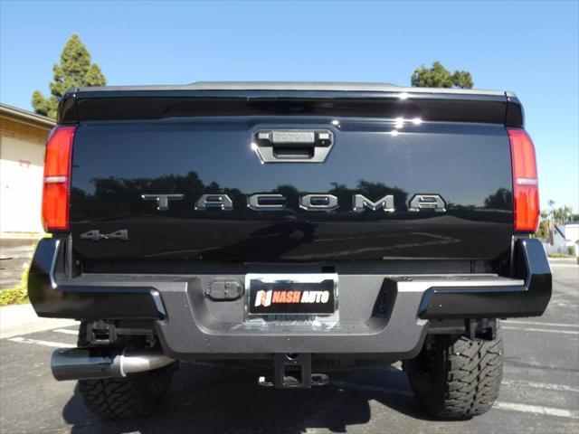 used 2025 Toyota Tacoma car, priced at $47,990