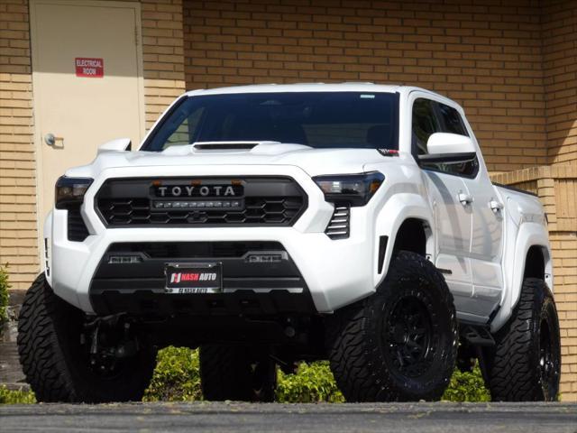 used 2025 Toyota Tacoma car, priced at $51,450