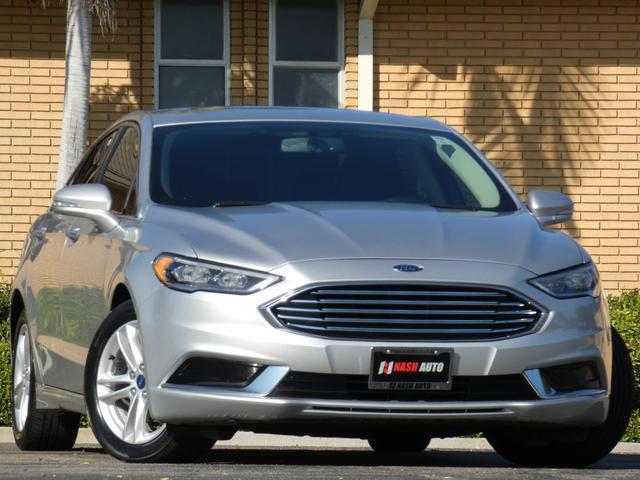 used 2018 Ford Fusion car, priced at $13,390