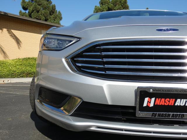 used 2018 Ford Fusion car, priced at $13,390