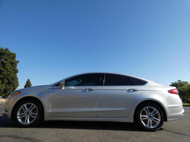 used 2018 Ford Fusion car, priced at $11,990