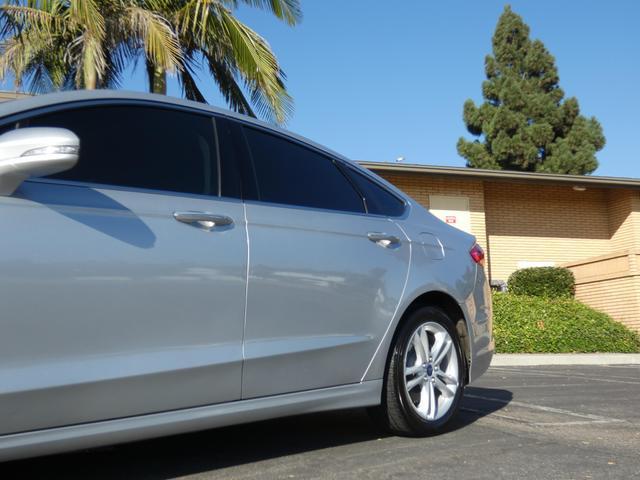 used 2018 Ford Fusion car, priced at $13,390