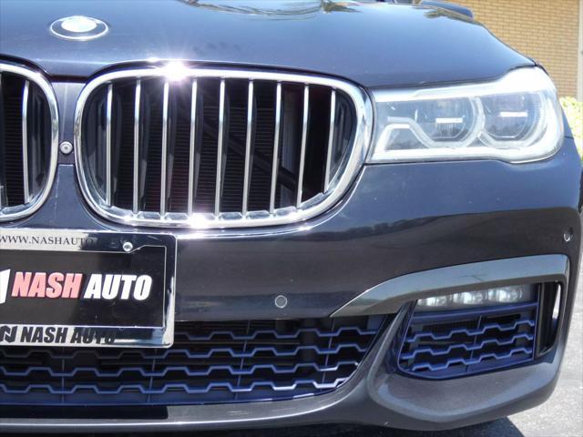 used 2016 BMW 750 car, priced at $24,990