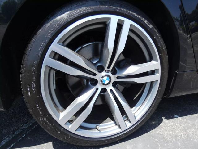 used 2016 BMW 750 car, priced at $24,990