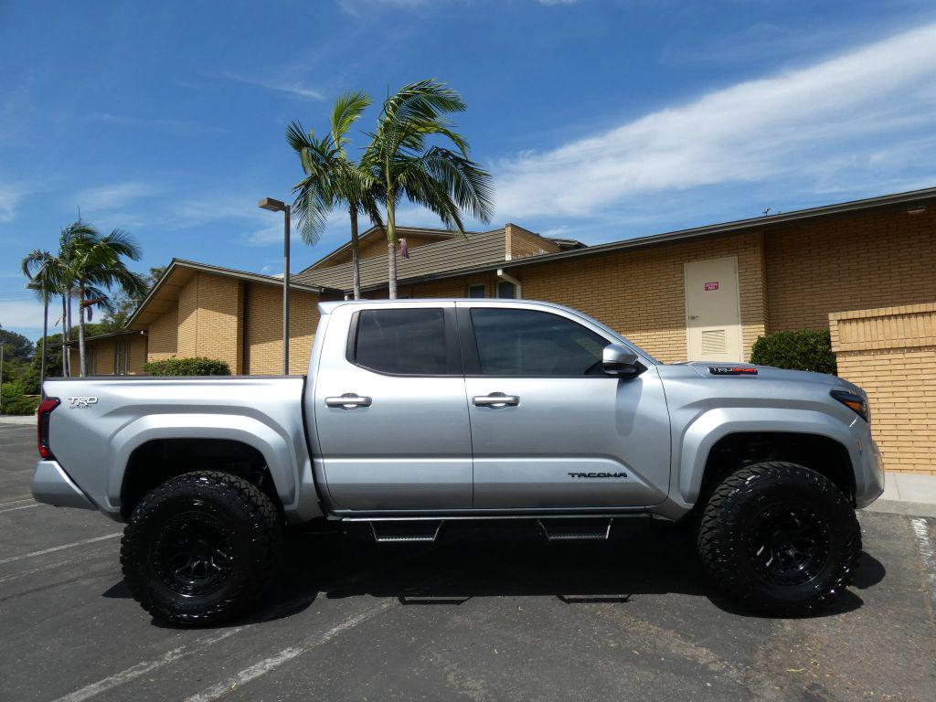 used 2024 Toyota Tacoma car, priced at $45,990