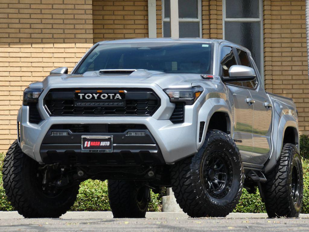 used 2024 Toyota Tacoma car, priced at $45,990