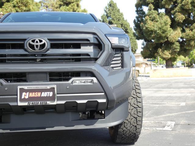 used 2024 Toyota Tacoma car, priced at $48,990