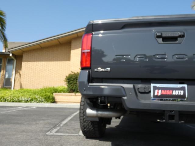 used 2024 Toyota Tacoma car, priced at $48,990