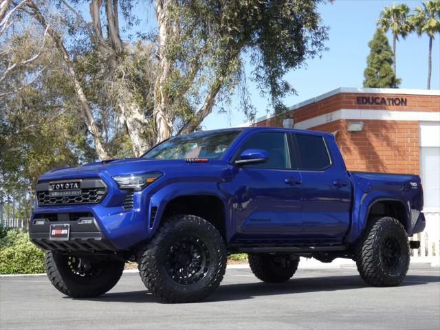 used 2025 Toyota Tacoma car, priced at $52,990