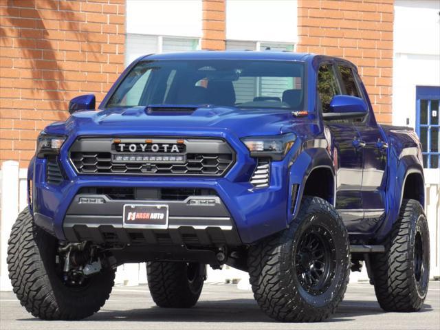 used 2025 Toyota Tacoma car, priced at $52,990