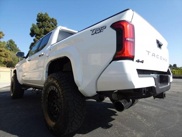 used 2025 Toyota Tacoma car, priced at $49,990