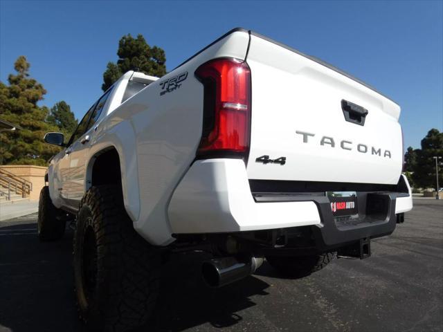 used 2025 Toyota Tacoma car, priced at $49,990