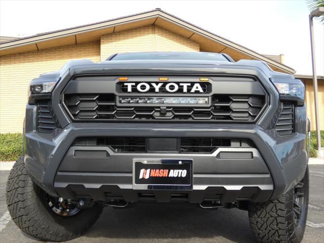 used 2024 Toyota Tacoma car, priced at $37,990