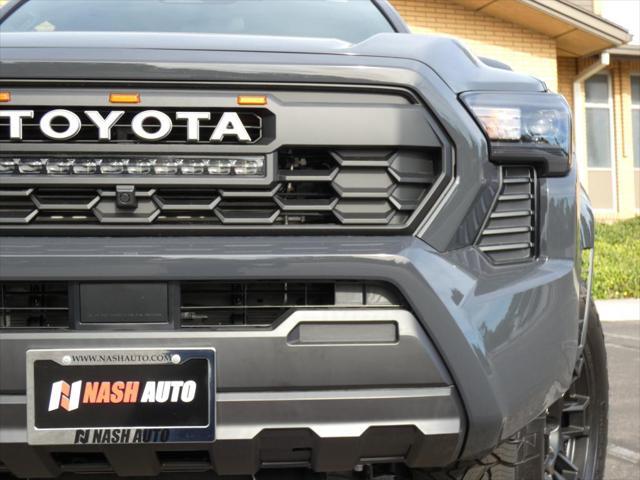 used 2024 Toyota Tacoma car, priced at $37,990