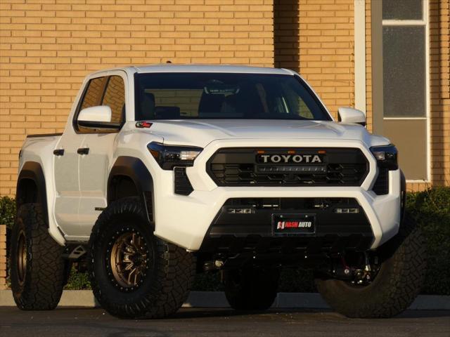 used 2024 Toyota Tacoma car, priced at $50,990