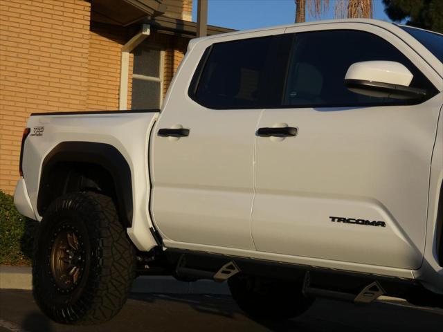 used 2024 Toyota Tacoma car, priced at $50,990