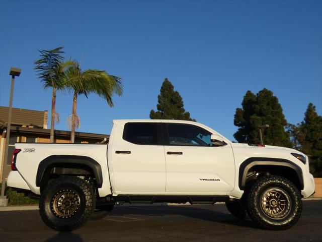 used 2024 Toyota Tacoma car, priced at $50,990