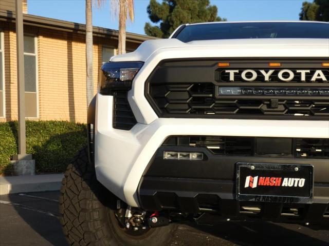 used 2024 Toyota Tacoma car, priced at $50,990