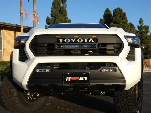 used 2024 Toyota Tacoma car, priced at $50,990