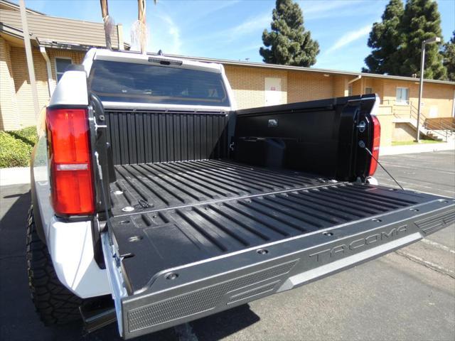 used 2024 Toyota Tacoma car, priced at $50,990