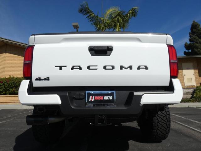 used 2024 Toyota Tacoma car, priced at $50,990