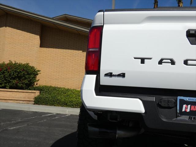 used 2024 Toyota Tacoma car, priced at $50,990