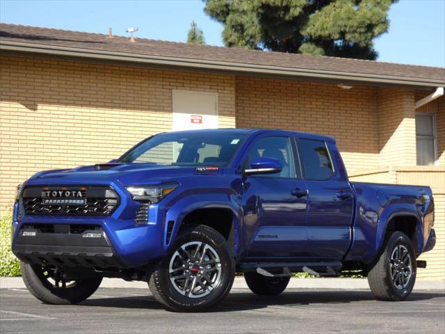 used 2025 Toyota Tacoma car, priced at $47,990