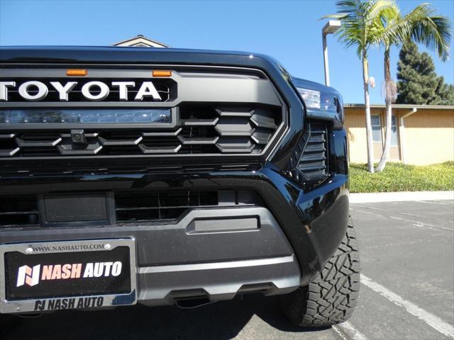 used 2024 Toyota Tacoma car, priced at $37,990