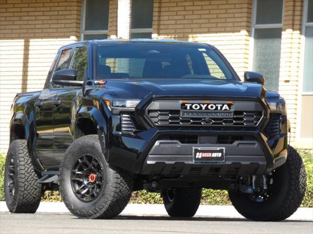 used 2024 Toyota Tacoma car, priced at $37,990