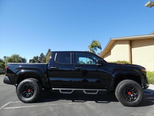 used 2024 Toyota Tacoma car, priced at $37,990