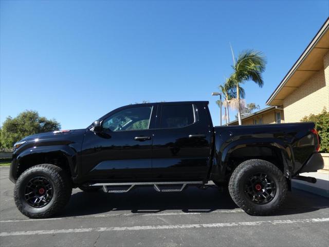 used 2024 Toyota Tacoma car, priced at $37,990